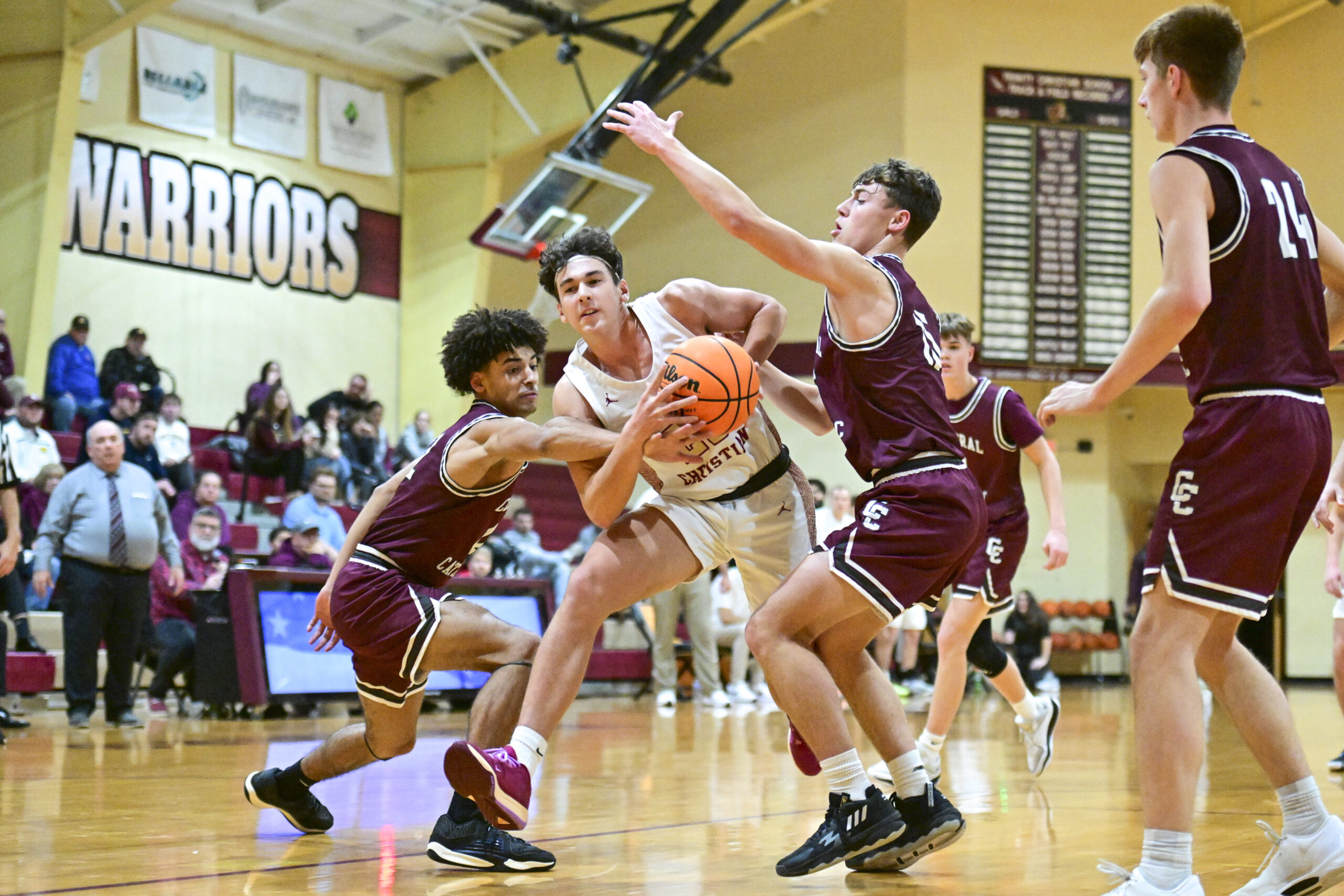 Wheeling Central uses size, speed to top Trinity Christian 77-47